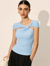 Light blue asymmetrical top with twist detail