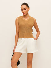 Beige knit sleeveless top with side lace closure