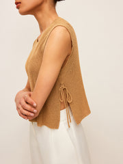 Beige knit sleeveless top with side lace closure