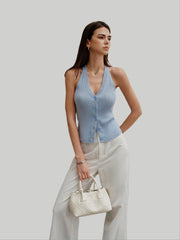 Blue ribbed sleeveless shirt with buttons