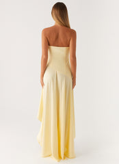 Light yellow strapless long dress with ruffles