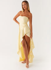 Light yellow strapless long dress with ruffles
