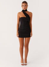 Black mini dress with asymmetrical shawl detail