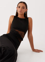 Long black dress with lace inserts