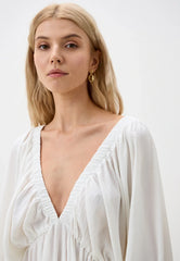 Ivory V-neck flowy mini dress