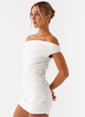 White off-the-shoulder mini dress with draping