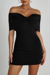 Black off-the-shoulder mini dress with bow detail