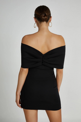 Black off-the-shoulder mini dress with bow detail