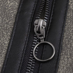 Short jacket with stand-up collar and buckle details