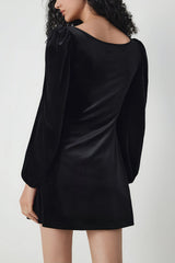 Black velvet dress with long puff sleeves