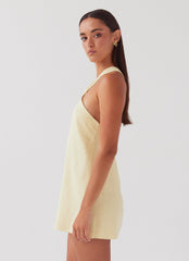 Light yellow backless mini dress