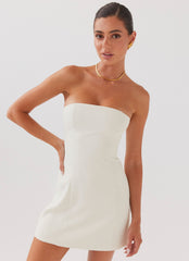White off-the-shoulder mini dress with draping