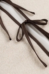 Short white jacket with contrasting piping