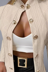 Jacket with stand-up collar and crest buttons