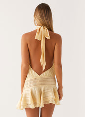 Yellow pleated backless mini dress