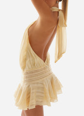 Yellow pleated backless mini dress