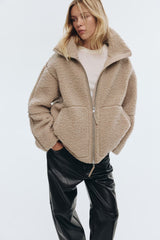 Beige teddy jacket with high collar and zipper