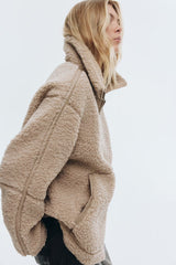 Beige teddy jacket with high collar and zipper