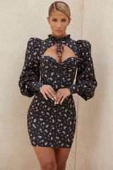 Miniklänning med puffärmar och blommigt tryck