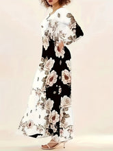 Elegant långklänning med blommigt tryck