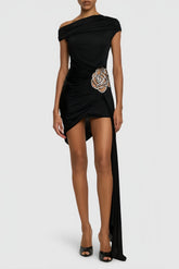 Black asymmetrical mini dress with pink appliqués and straps