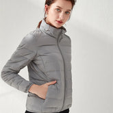 Lightweight puffer jacket with high collar and slim fit