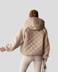 Beige quilted jacket with hood and teddy sleeves