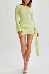 Light green mini dress with draped details