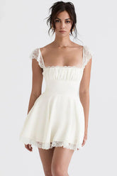 White mini dress with lace trim