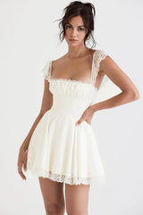 White mini dress with lace trim