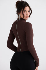 Brun stickad korsett med dragkedja i ryggen