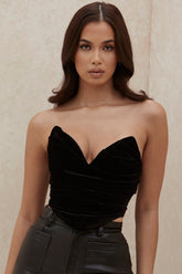 Svart sammetsdraperad tvinnad korsett