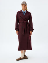 Burgundy long trench coat with tie belt