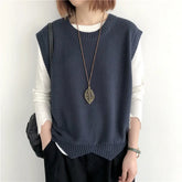 Knitted vest with structure and side slits