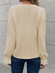 Blouse with lace trim and puff sleeves