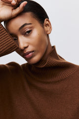 High neck ticked sweater with wide sleeves