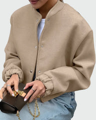 Beige short bomber jacket with elasticated hem