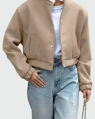 Beige short bomber jacket with elasticated hem