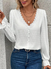 Blouse with lace trim and puff sleeves