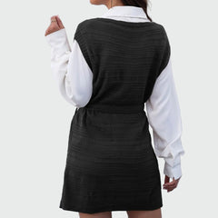 Sleeveless knitted dress with belt and front slit