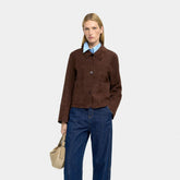 Short boxy jacket with patch pockets