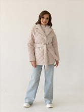 Beige quilted jacket with belt and shawl collar