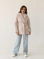 Beige quilted jacket with belt and shawl collar