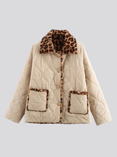 Cream double-sided quilted jacket with leopard details