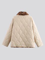 Cream double-sided quilted jacket with leopard details