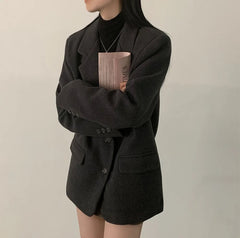 Oversized long blazer with pocket flaps