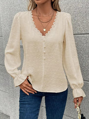 Blouse with lace trim and puff sleeves