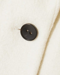 White long coat with belt and shawl collar