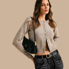 Short cardigan with ribbed edges and button placket