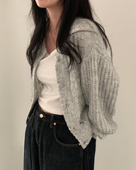 Gray knitted cardigan with dropped shoulders